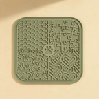 Buddies silicone slow-feed licking mat in sage green. Same 4-quadrant slow-feed pattern.